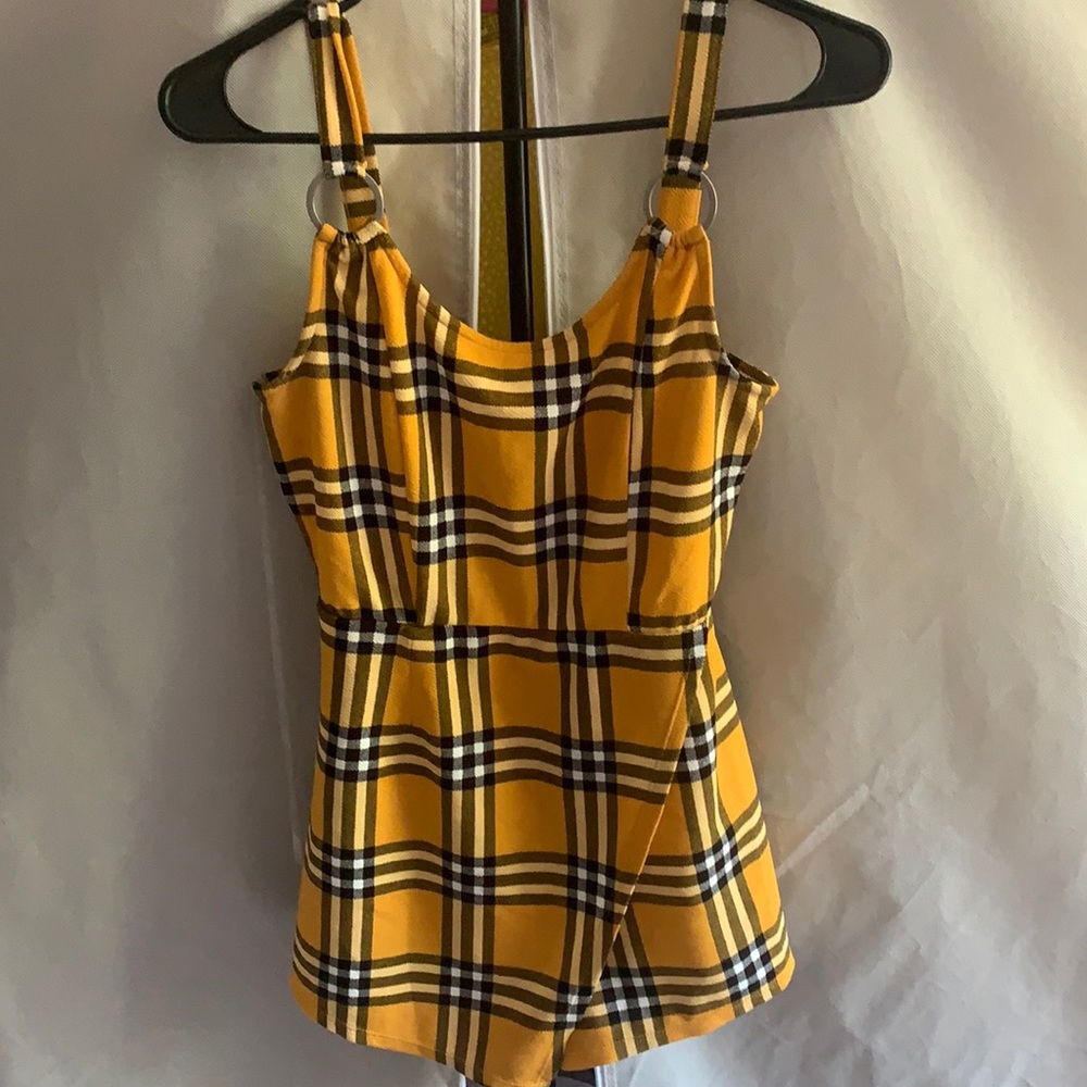 Yellow jumper it’s like short and skirt super cute 🥰
